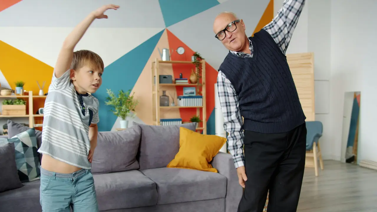 Grandfather exercising with grandson